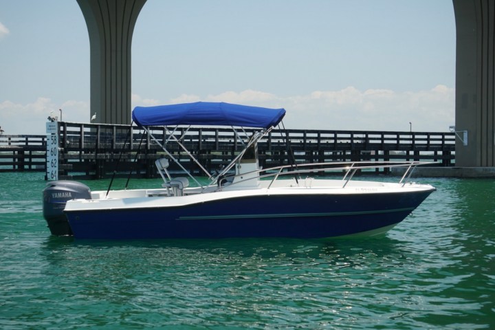 a small boat in a large body of water