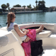 Someone relaxing in the sun aboard a TV Boat Rental