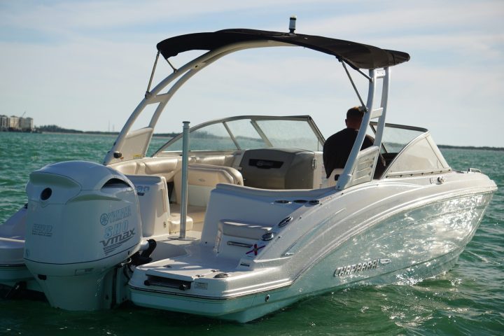 a small boat in a body of water