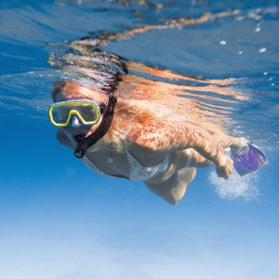 a person swimming in the water