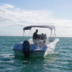 a small boat in a body of water