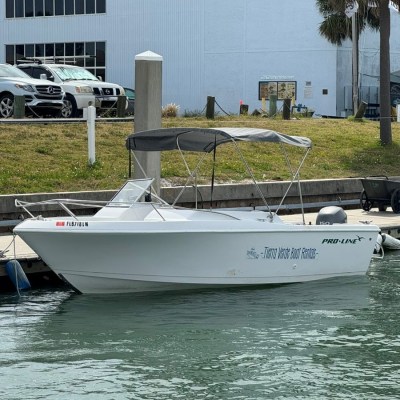 a boat docked at the St Pete wharf