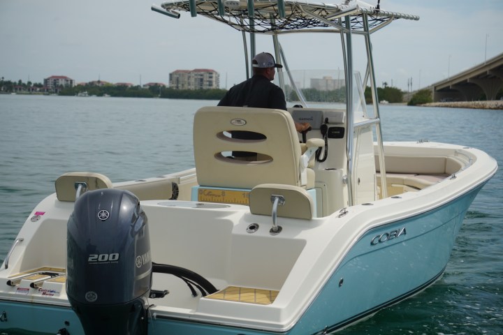 man driving a cobia boat in St Pete