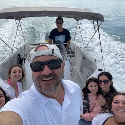 a group of people on a St Pete rental boat posing for the camera