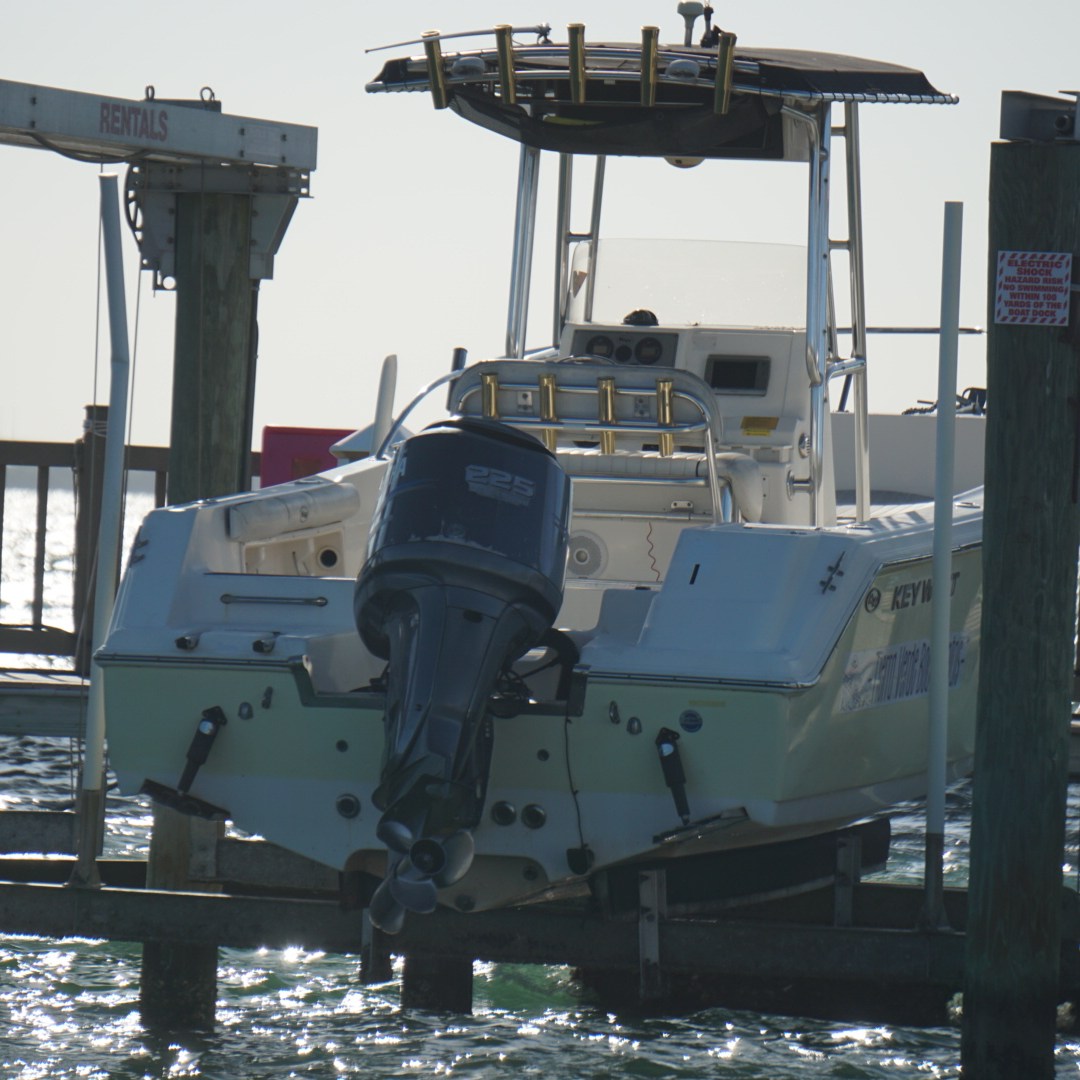 Boat being elevated and raised out of the water